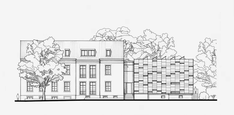 Das ehemaliger Verwaltungsgebäude hat zwei Stockwerke und ein Dachgeschoss sowie ein teilweise sichtbares Kellergeschoss. Die Fassade wird durch große Fenster unterbrochen. Davor steht ein Baum. Die Technikzentrale ist durch einen kurzen Verbinder inklusi