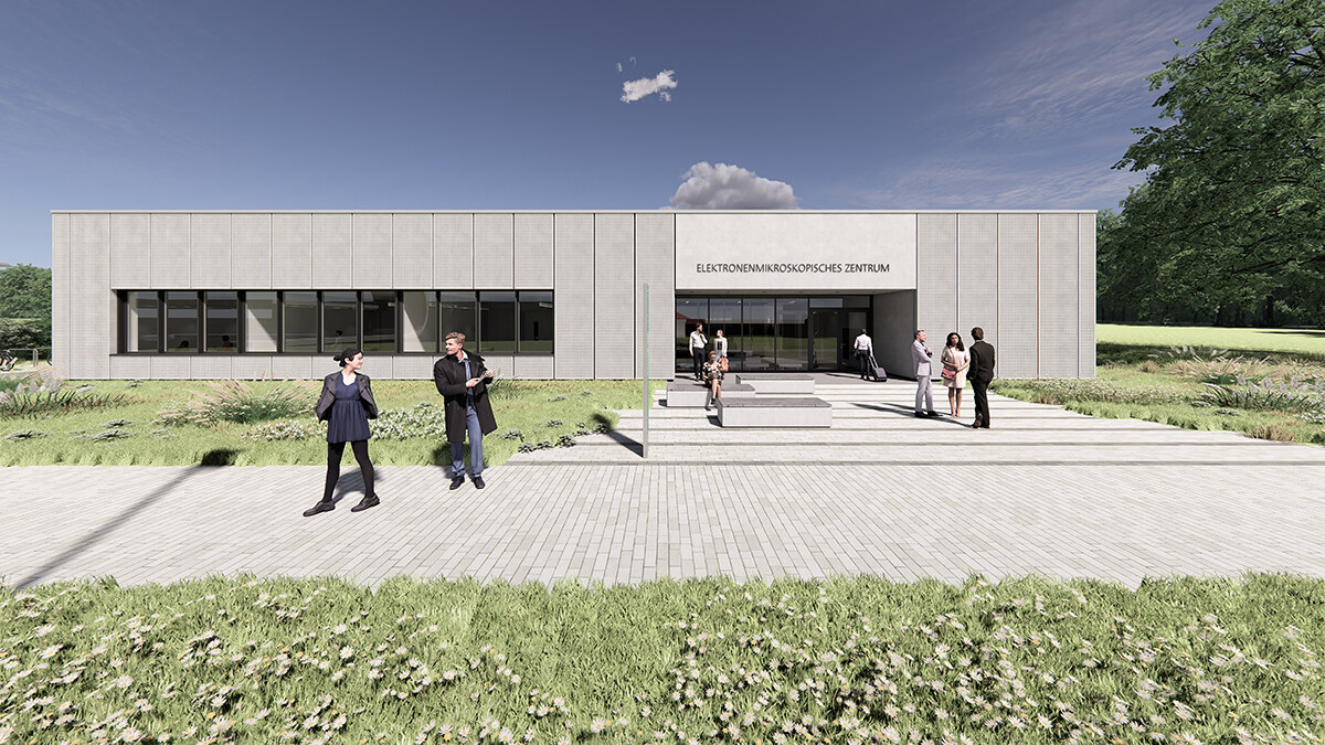 Der Architektenentwurf des neuen Elektronenmikroskopischen Zentrums der TU Chemnitz. Zu sehen ist ein eingeschossiger Bau in hellgrauer Farbe mit gepflastertem Weg davor.